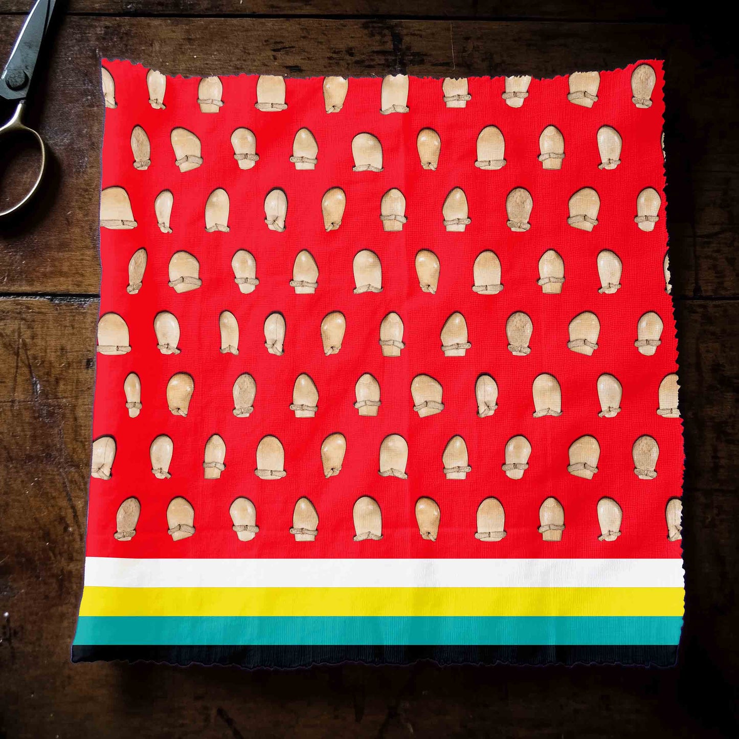 Elk Teeth on Red Fabric