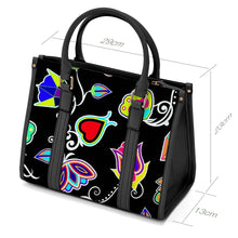 Load image into Gallery viewer, Indigenous Paisley Black Convertible Hand or Shoulder Bag
