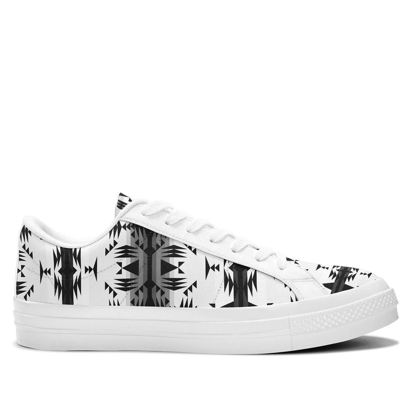 Between the Mountains White and Black Aapisi Low Top Canvas Shoes White Sole 49 Dzine 